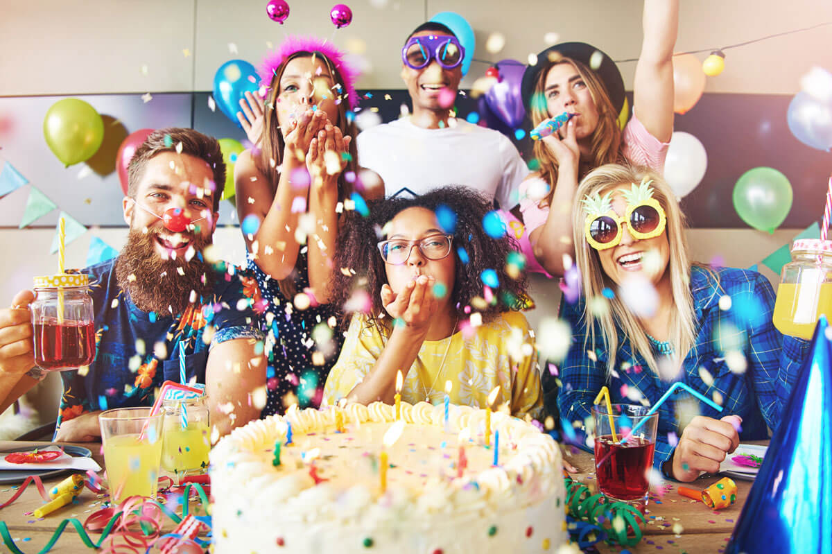 confetti-flying-around-group-celebrating-a-party-PZSGJ5F
